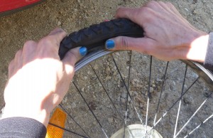 Thumbs. Changing a bike tyre. goRide