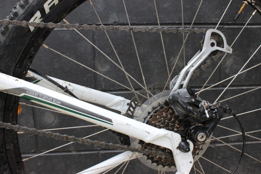 Rear derailleur in its normal position blocks the lifting of your wheel